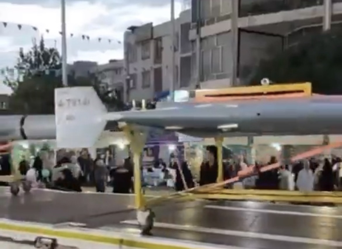 Iran paraded Shahed-136 drones through Tehran in major rallies supporting its armed forces. The display comes as the regime faces a U.S. naval blockade and continued military pressure, signaling resilience and asymmetric warfare capabilities