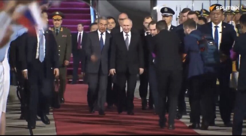 Strategic Calibration: Russian President Vladimir Putin is greeted by Chinese Foreign Minister Wang Yi upon landing in Beijing on May 19, 2026, in image_26.png. The two-day visit is timed to mark the 25th anniversary of the 2001 Sino-Russian Treaty of Friendship and the official launch of the China-Russia Years of Education (2026–2027). Coming hot on the heels of the recent Trump-Xi summit, the meeting allows Putin and Xi to project a unified front and reaffirm an economic and strategic partnership that Putin noted has reached an "unprecedented level." Photo: Maxim Shemetov / Reuters