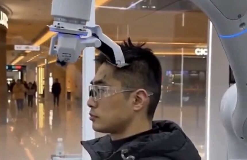 Precision Grooming: Major urban centers across China have begun commercializing fully autonomous, AI-driven robot barber kiosks to offer rapid and highly uniform haircuts. As captured in image_32.png, the system utilizes advanced 3D structural scanning technology to map out the unique contours of an individual's scalp and hair density before executing the trim with millimeter precision. Programmed with a wide variety of domestic and international styling templates, these automated booths operate around the clock. They cater heavily to budget-conscious consumers by slashing the price of a standard men's trim to an ultra-cheap 60 yen ($0.40 USD), heavily disrupting the traditional local grooming service industry. Photo: Phemex News / Xinhua